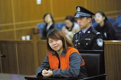 2013年4月3日，被告人小萍在法庭上受審。新京報記者 王貴彬 攝